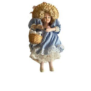 •	New Kurt Adler/Joycelyn Mostorm KSA Collectible 7-inch Porcelain Doll